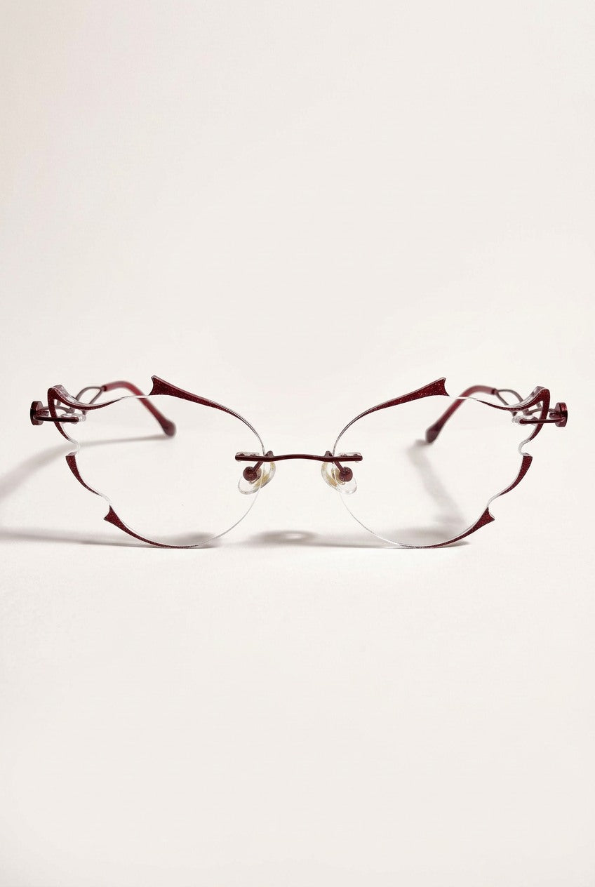 SCULPTED RIMLESSEYEWEAR WITH GLITTER ACCENTS