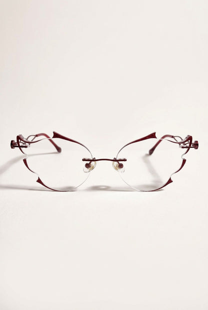 SCULPTED RIMLESSEYEWEAR WITH GLITTER ACCENTS