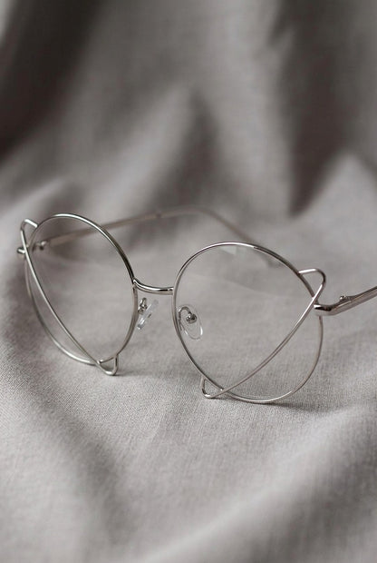 ABSTRACT LOOPED ROUND STATEMENT EYEWEAR