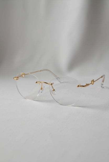 WHIMSICAL ROUND RIMLESSEYEWEAR