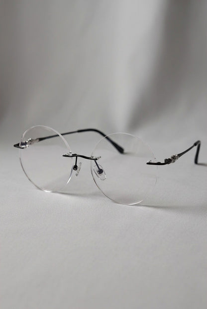 PLAYFUL SILHOUETTE ACCENT ROUND RIMLESS EYEWEAR