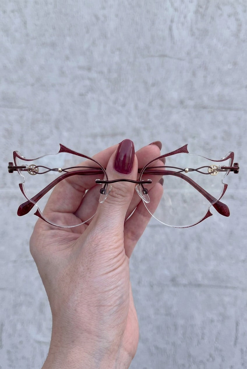 SCULPTED RIMLESSEYEWEAR WITH GLITTER ACCENTS