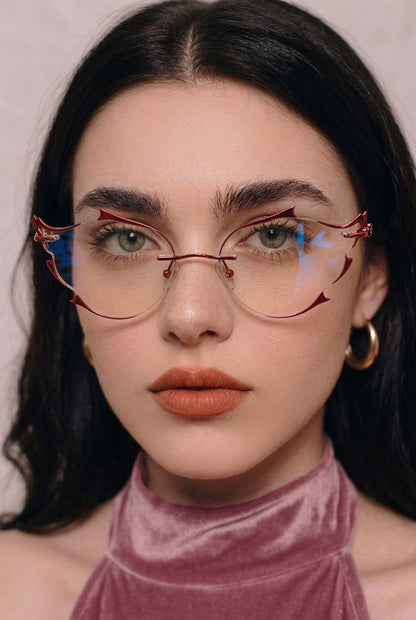SCULPTED RIMLESSEYEWEAR WITH GLITTER ACCENTS