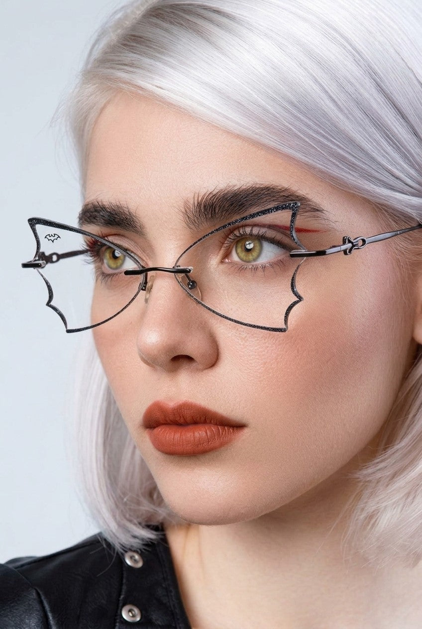 BAT WING RIMLESS EYEWEAR WITH GLITTER ACCENTS